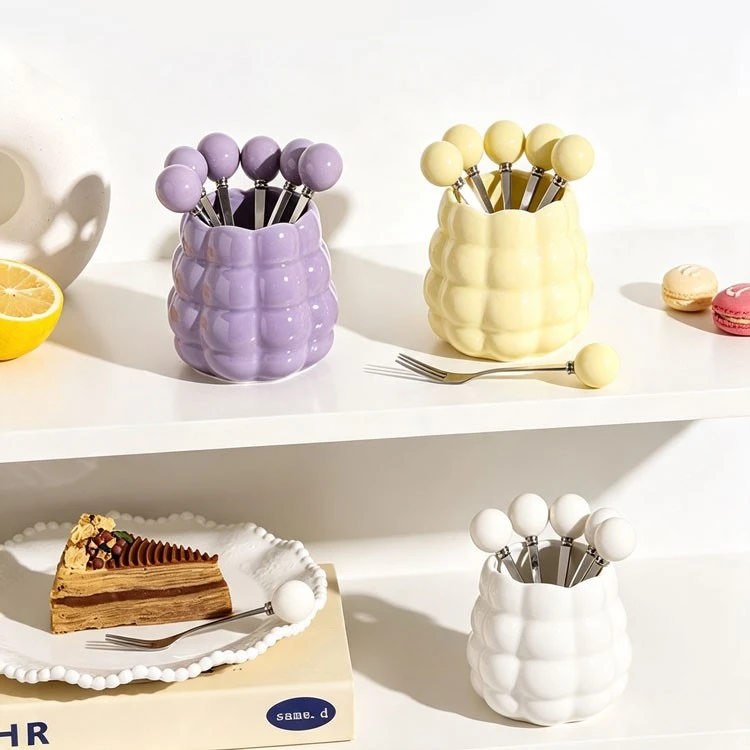 ceramic jar with small forks 2